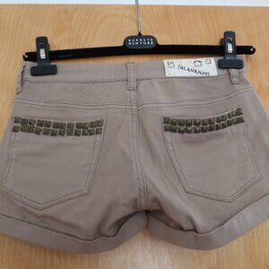 Blank NYC cuffed tan shorts with gold tone pyramid studs on back pockets size 26